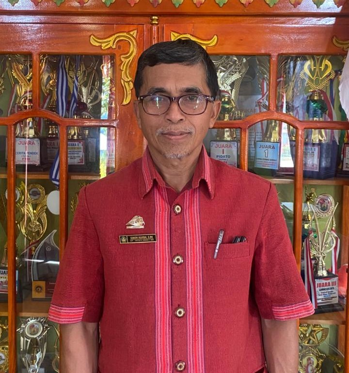 Simon Manda’, S.Pd